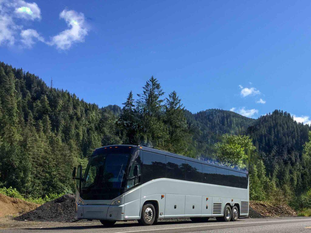 56-passenger Luxury Motorcoach on a scenic trip