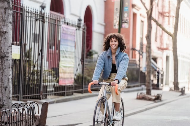 A Woman riding a bike